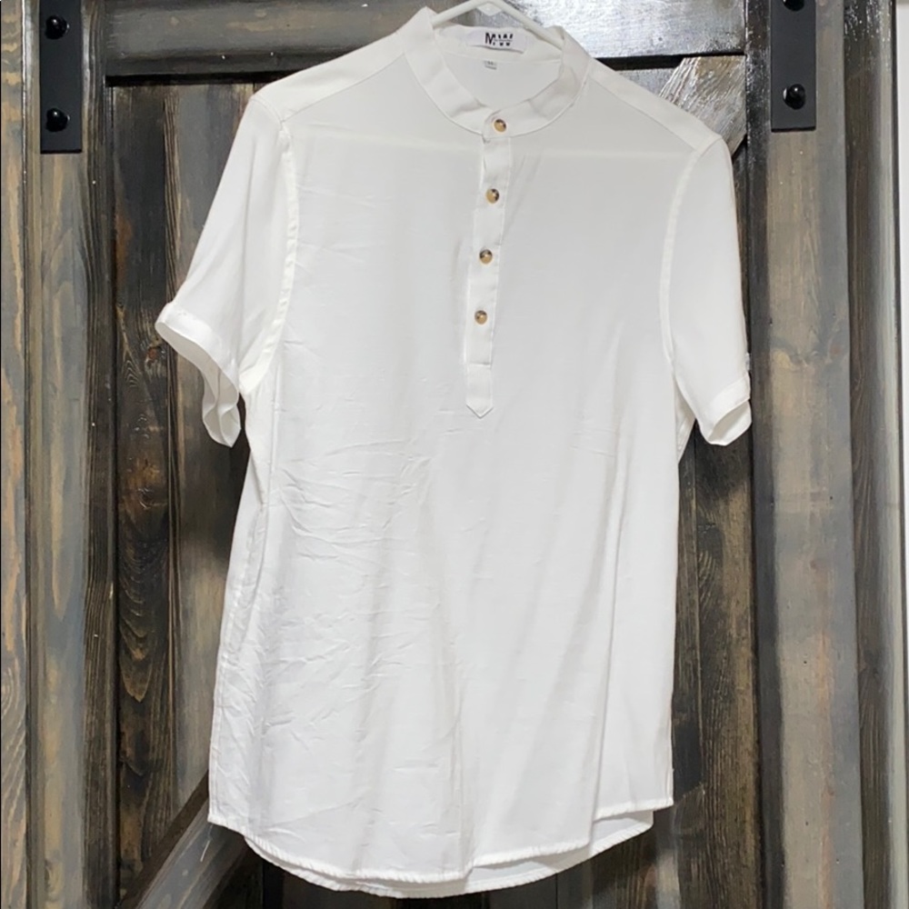 It’s an off white half way casual button up